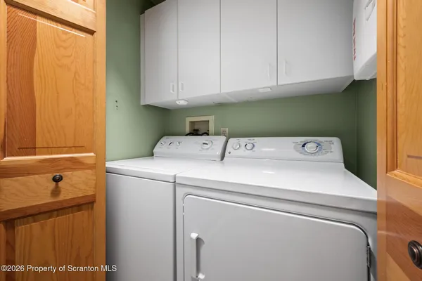a view of a balcony with wooden floor