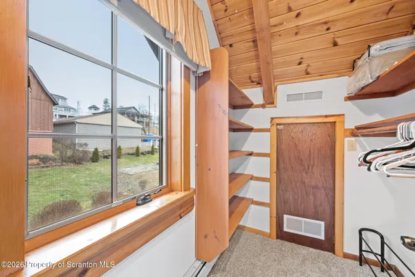a terrace with outdoor seating and ocean view