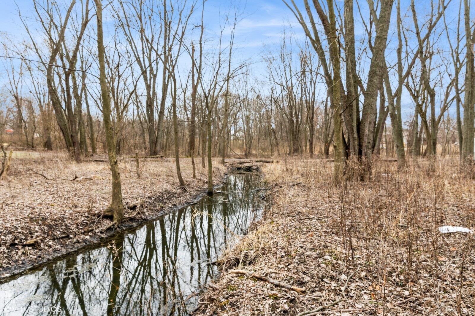 8317 Austin Avenue Schererville, IN 46375 - Photo 4 of 6 a view of outdoor space with wooden fence