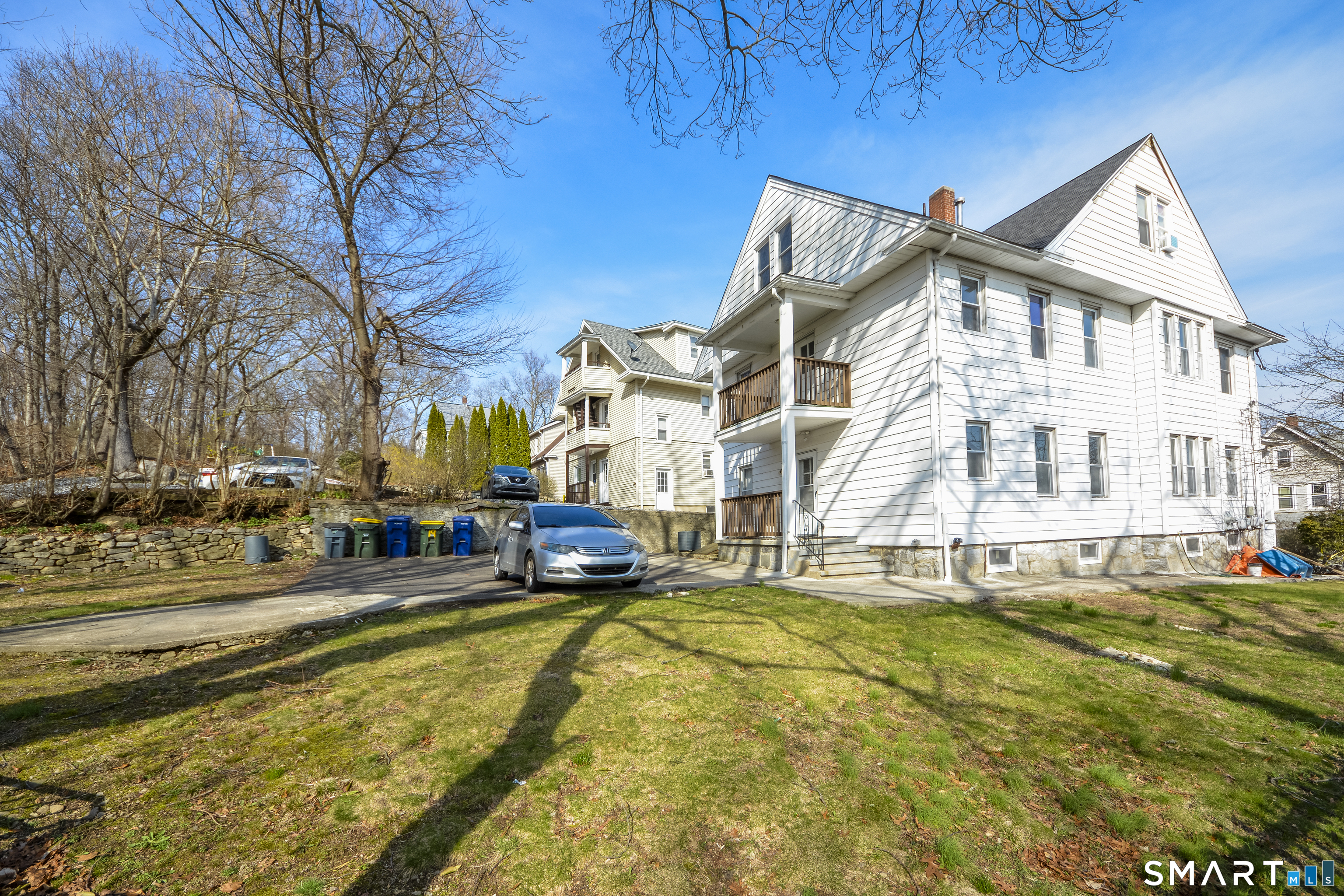 19-21 Ells Street Ansonia, CT 06401 - Photo 5 of 15 a view of a swimming pool with outdoor seating