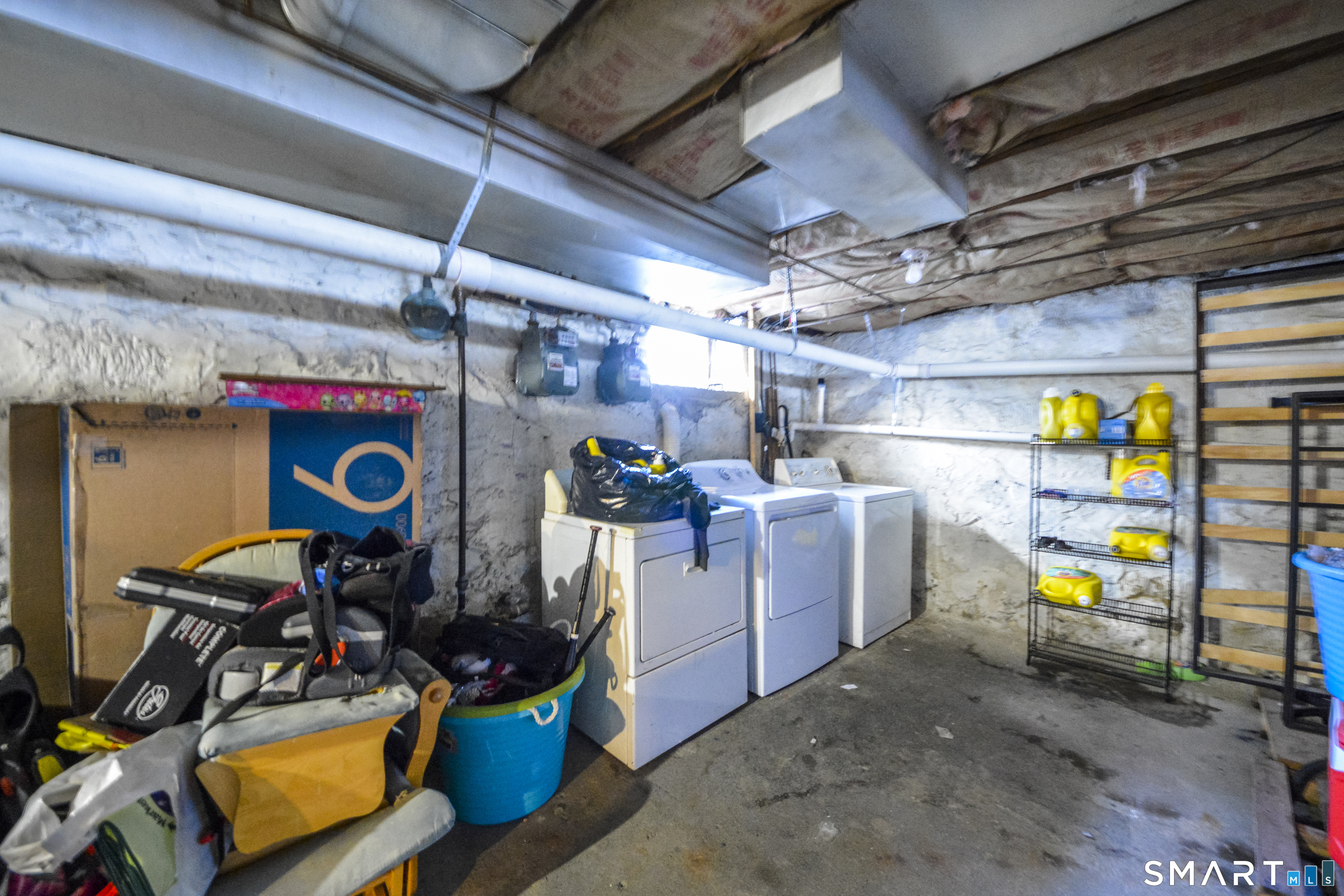 19-21 Ells Street Ansonia, CT 06401 - Photo 7 of 15 a view of a storage room with washer and dryer