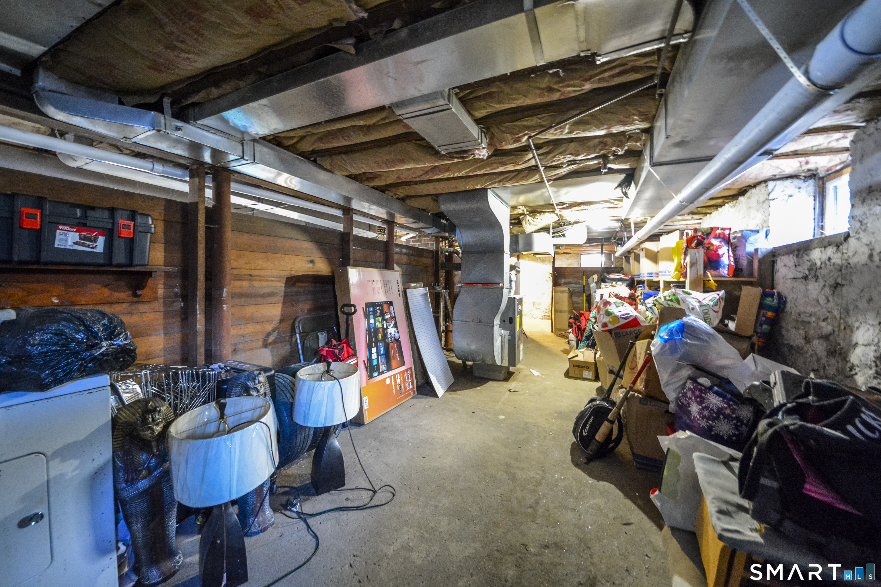 19-21 Ells Street Ansonia, CT 06401 - Photo 8 of 15 a view of a storage room with a lot of stuff