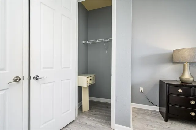 a front view of a building with a yard