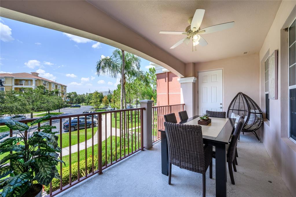 5012 Shoreway Loop, Unit 20507 Orlando, FL 32819 - Photo 28 of 49 a view of a dining room with furniture window and outside view
