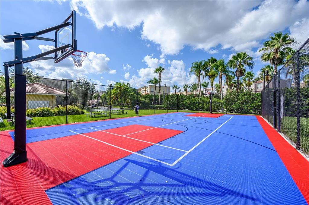 5012 Shoreway Loop, Unit 20507 Orlando, FL 32819 - Photo 45 of 49 a view of a tennis court