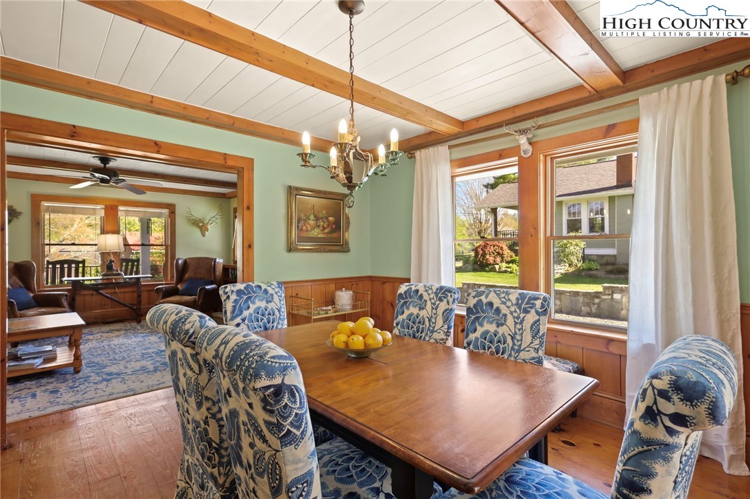 326 Ransom Street Blowing Rock, NC 28605 - Photo 11 of 25 a living room with furniture and a large window