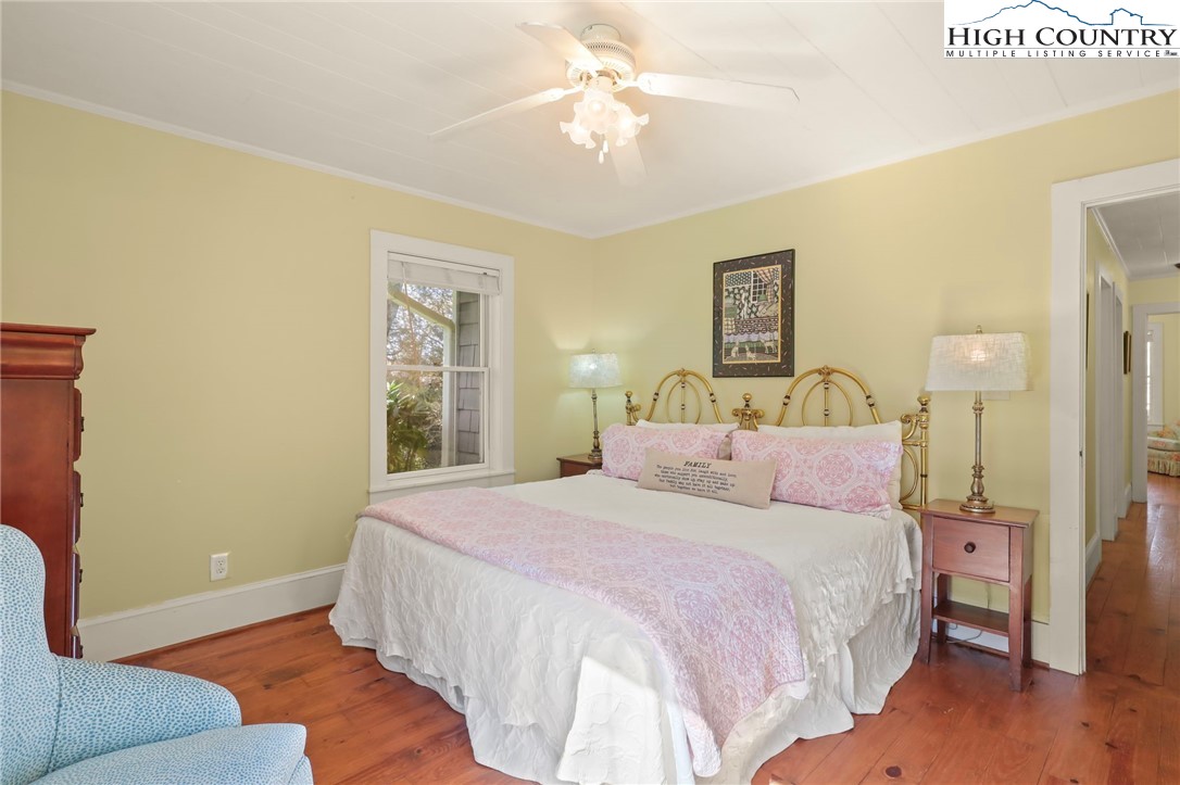 326 Ransom Street Blowing Rock, NC 28605 - Photo 19 of 25 a bedroom with a bed and a couch