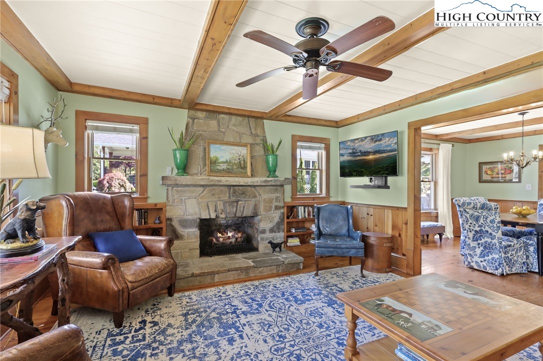 326 Ransom Street Blowing Rock, NC 28605 - Photo 6 of 25 a living room with furniture and a fireplace