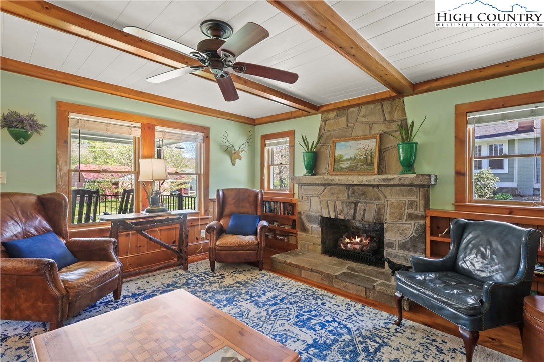 326 Ransom Street Blowing Rock, NC 28605 - Photo 7 of 25 a living room with furniture and a fireplace