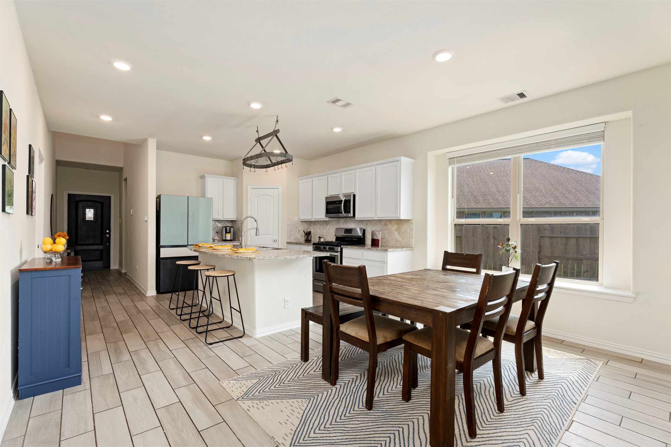 4710 Walnut Willow Ct Spring Spring, TX 77386 - Photo 11 of 42 Large dining area that connects the kitchen to the family room.