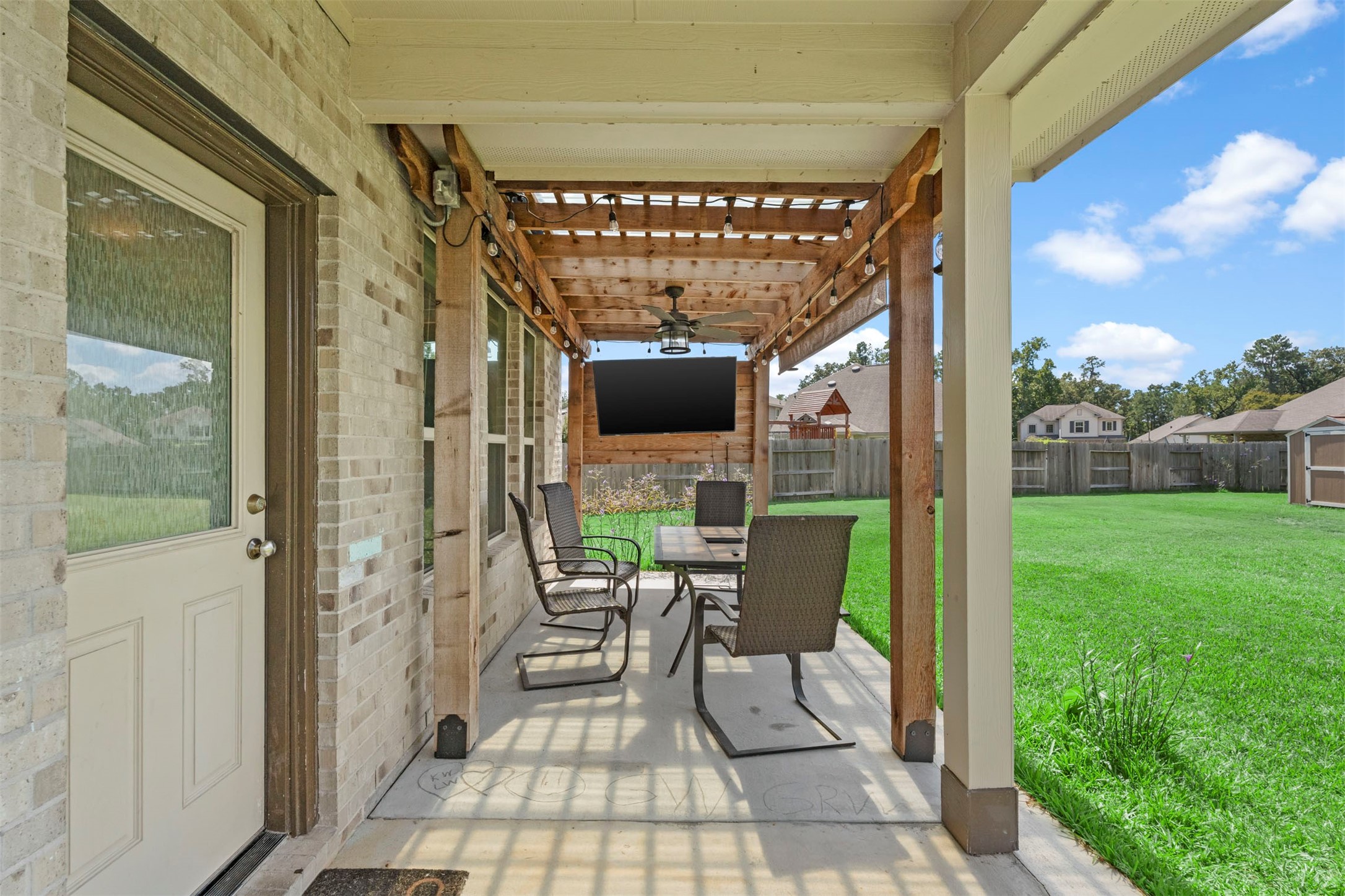 4710 Walnut Willow Ct Spring Spring, TX 77386 - Photo 32 of 42 Extended and covered patio. TV included!