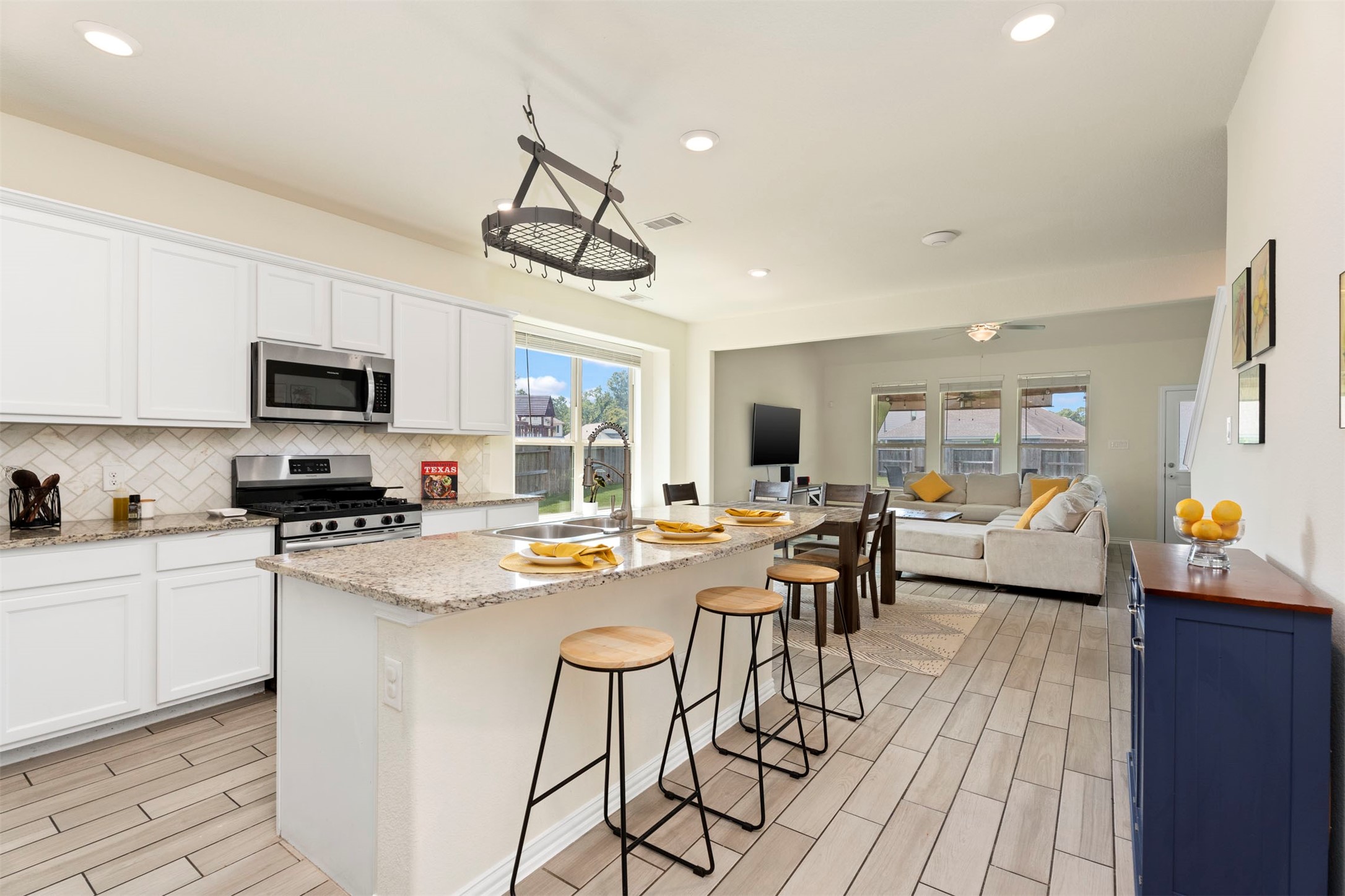 4710 Walnut Willow Ct Spring Spring, TX 77386 - Photo 6 of 42 Stunning island kitchen with bar seating.