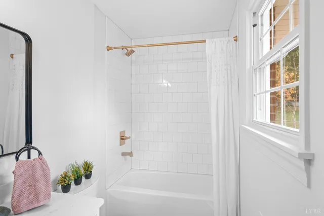 a view of entryway with wooden floor and stairs