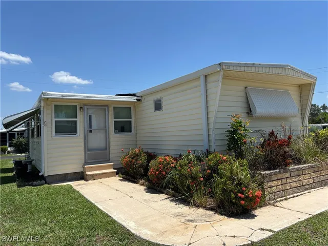 a front view of house with yard