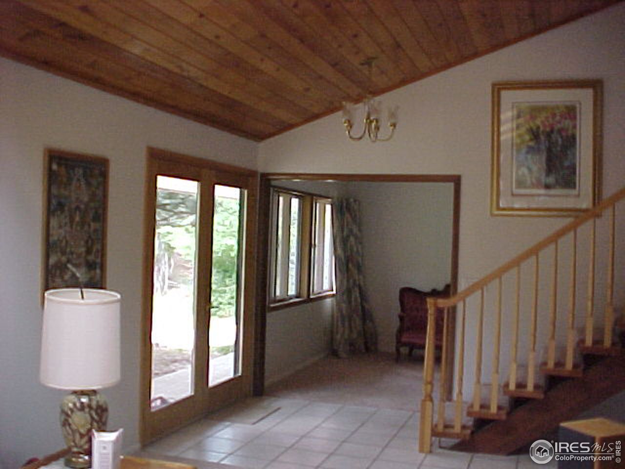 5267 Olde Stage Road Boulder, CO 80302 - Photo 8 of 17 a view of a hallway with entryway and stairs