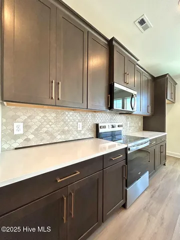 $499,900 | 901 Wild Azalea Way, Hubert, NC 28539