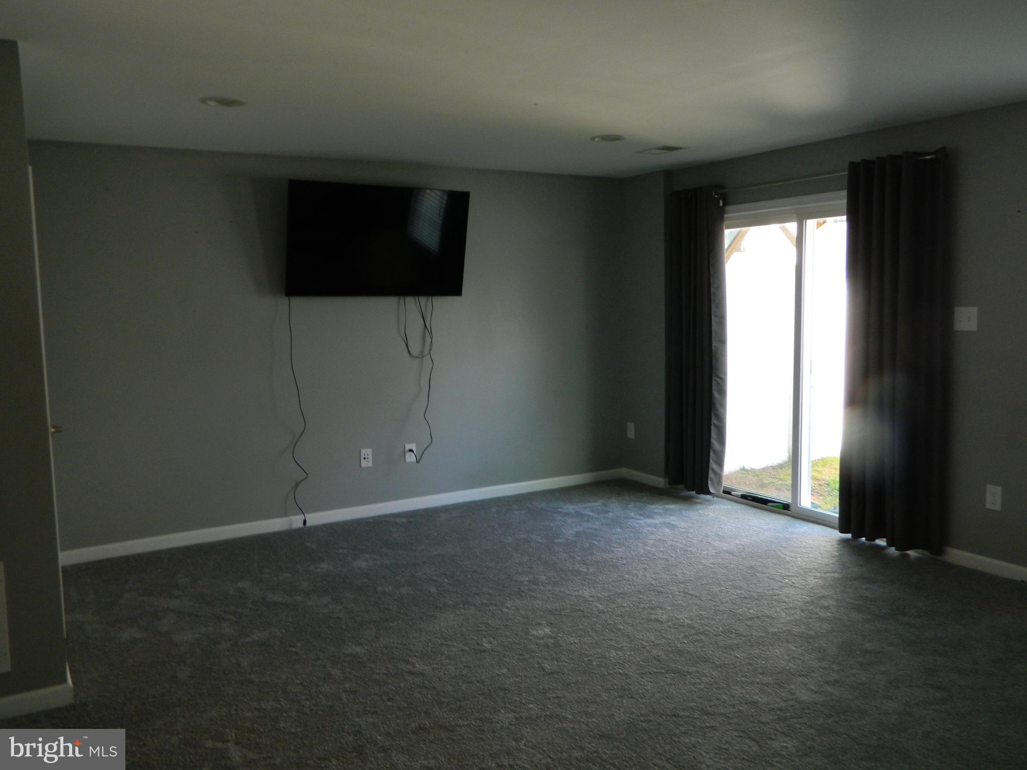 1043 Regency Place Sewell, NJ 08080 - Photo 15 of 22 First Floor Room/Exit to Backyard