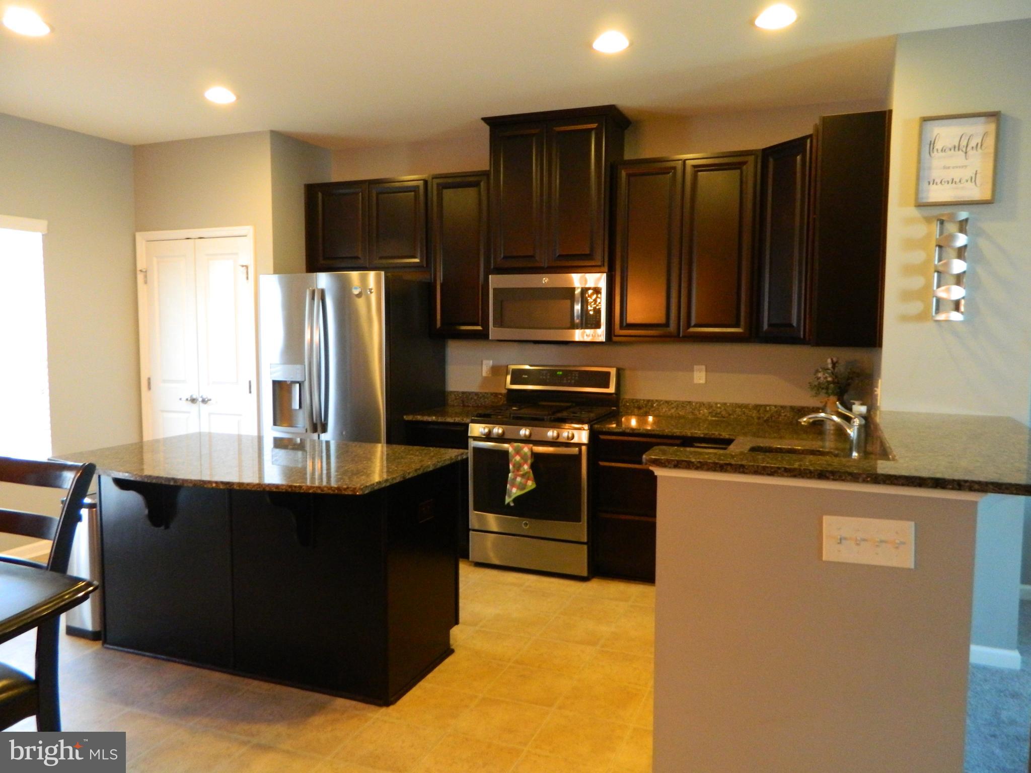 1043 Regency Place Sewell, NJ 08080 - Photo 6 of 22 Kitchen with Stainless Steel Appliances