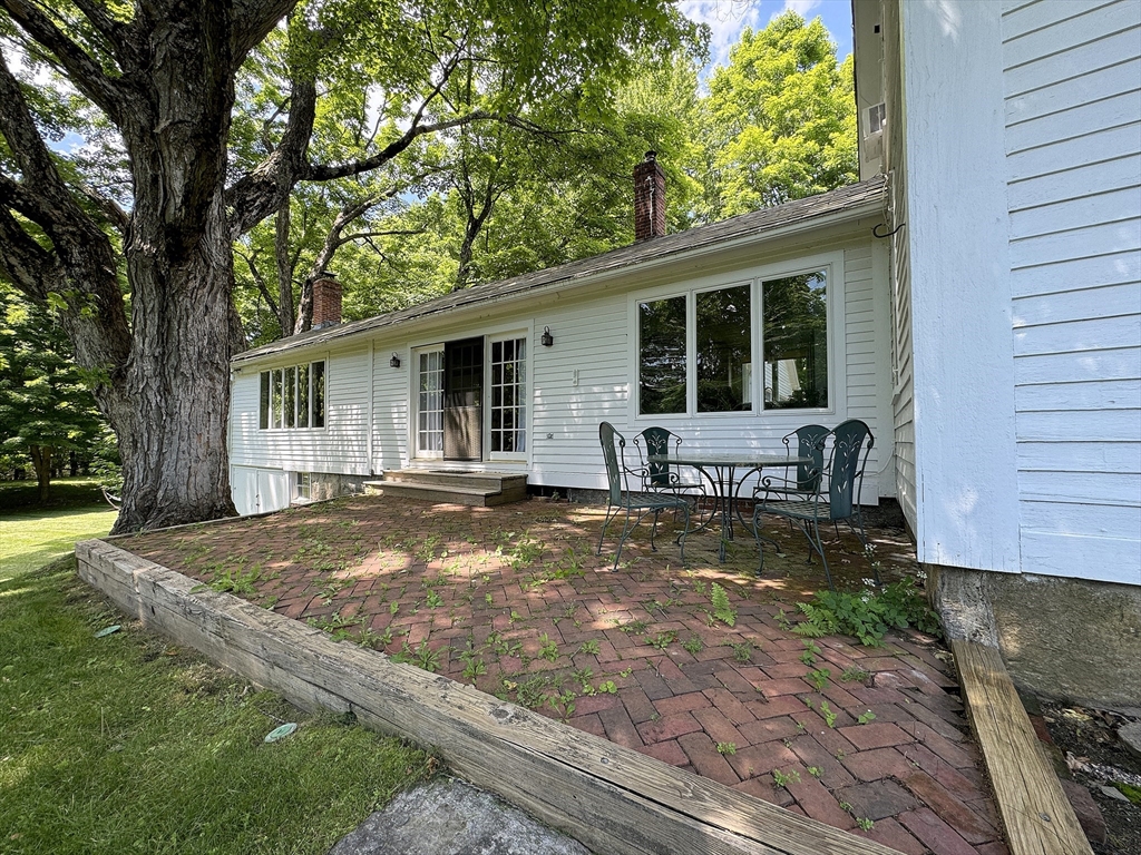 158 Flat Hills Road Amherst, MA 01002 - Photo 3 of 42 a view of a house with backyard and sitting area