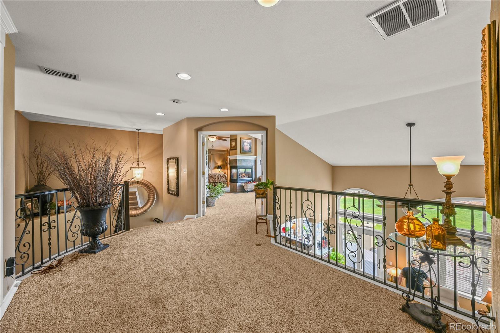 8518 High Ridge Court Castle Pines, CO 80108 - Photo 15 of 29 an empty room with windows & mountain view
