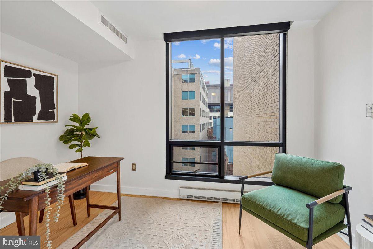 912 F Street Northwest, Unit 709 Washington, DC 20004 - Photo 17 of 28 a living room with furniture