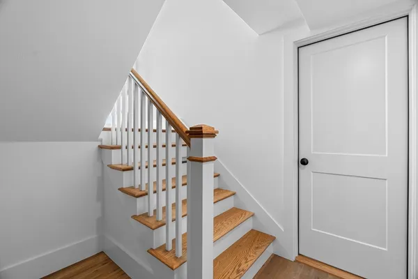 a view of entryway with wooden floor