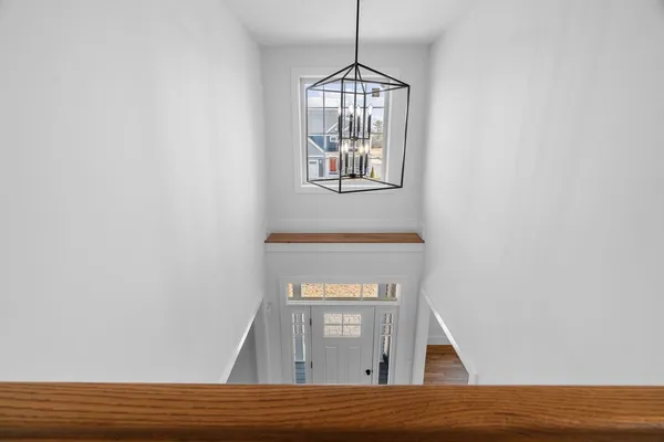a view of entryway with wooden floor