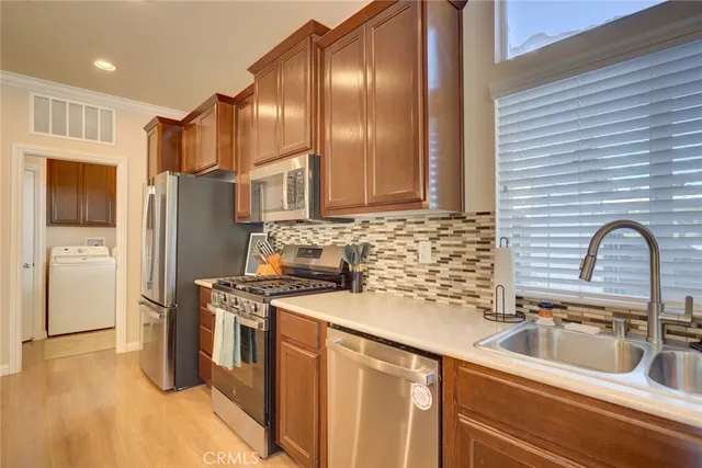a bedroom with bed and window