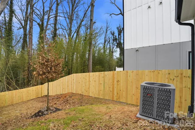 a view of a backyard of the house