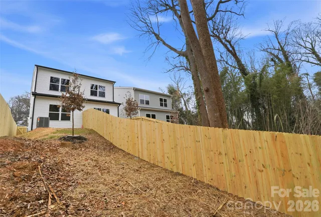 a view of a house with a snow in the background