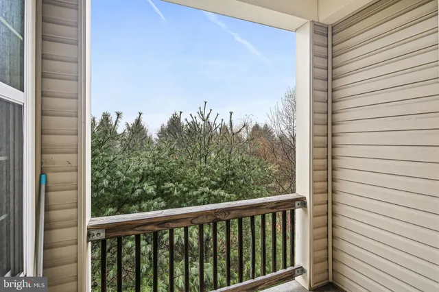 a view of a balcony with an outdoor space