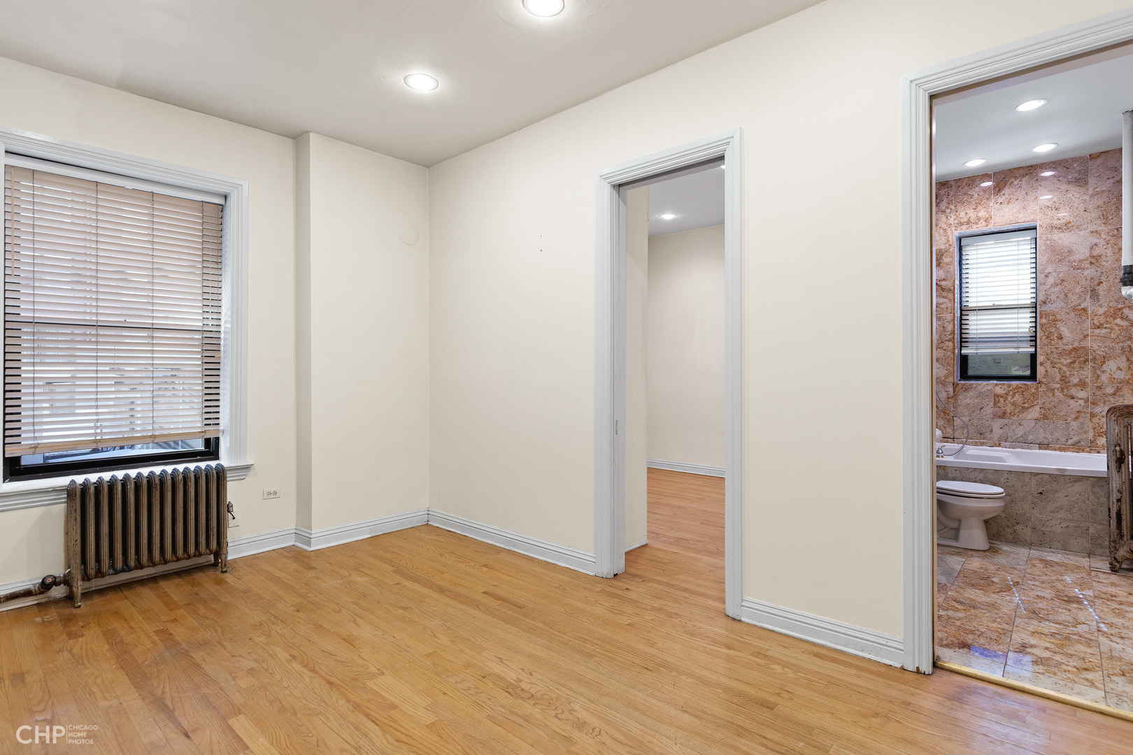 20 East Goethe Street, Unit 306 Chicago, IL 60610 - Photo 10 of 14 a view of an empty room and window