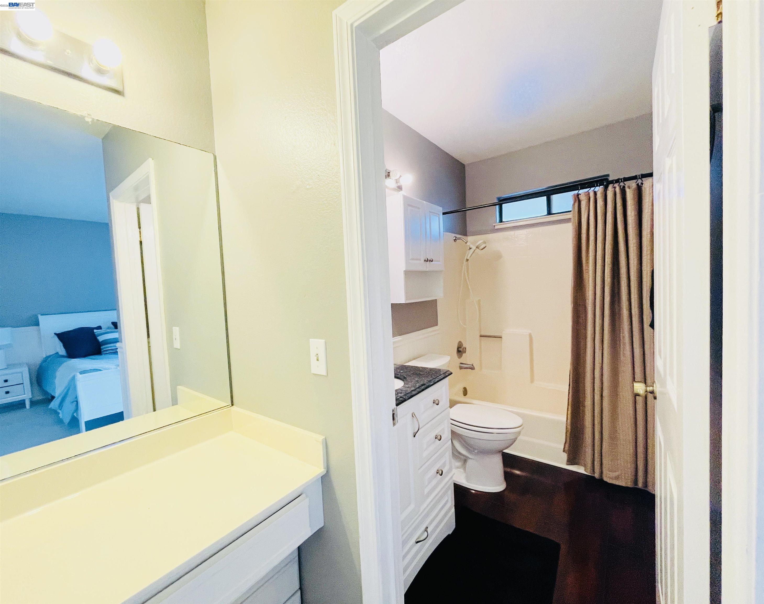 320 North Villa Way Walnut Creek, CA 94595 - Photo 21 of 36 a bathroom with a sink toilet and shower