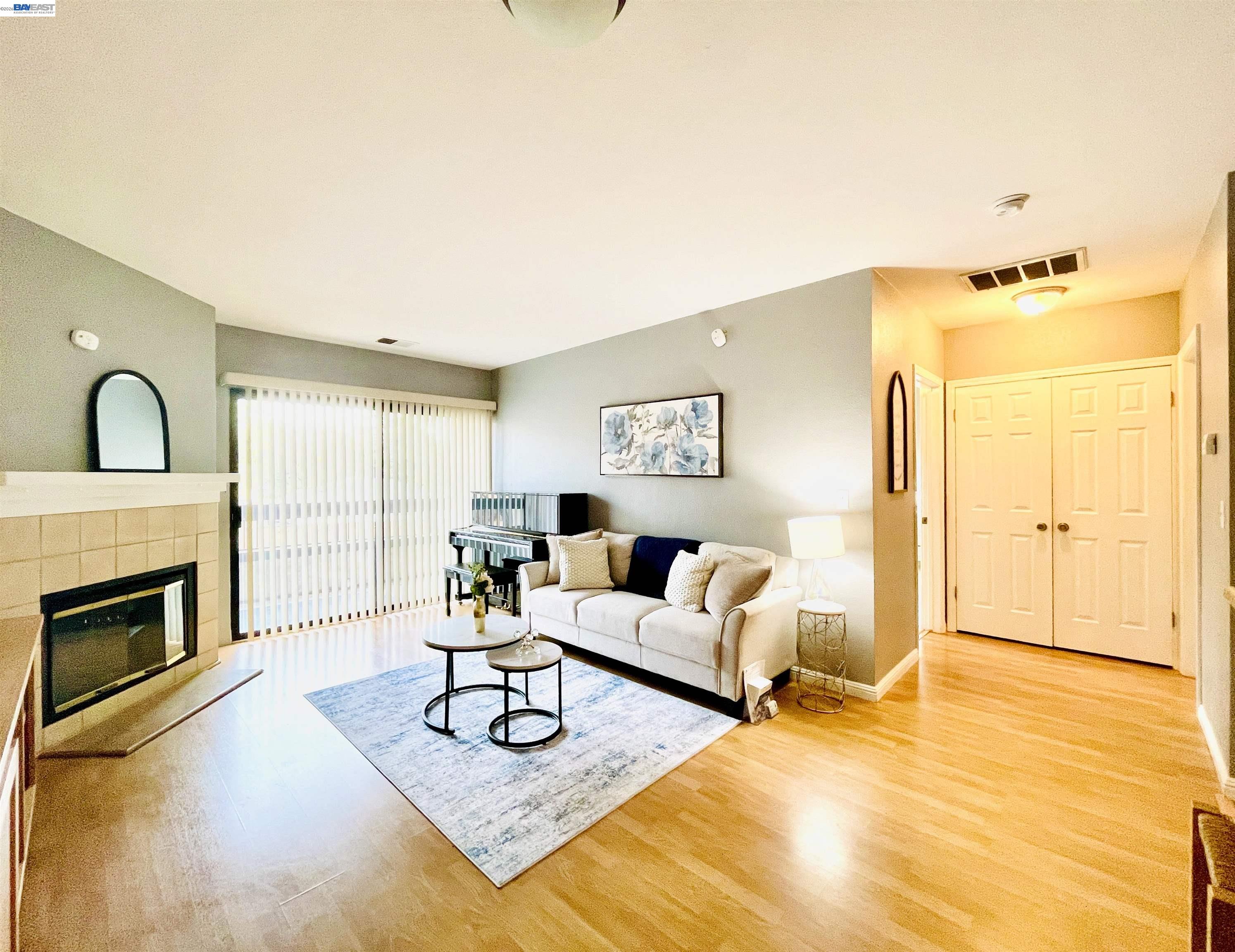 320 North Villa Way Walnut Creek, CA 94595 - Photo 5 of 36 a living room with furniture and a fireplace