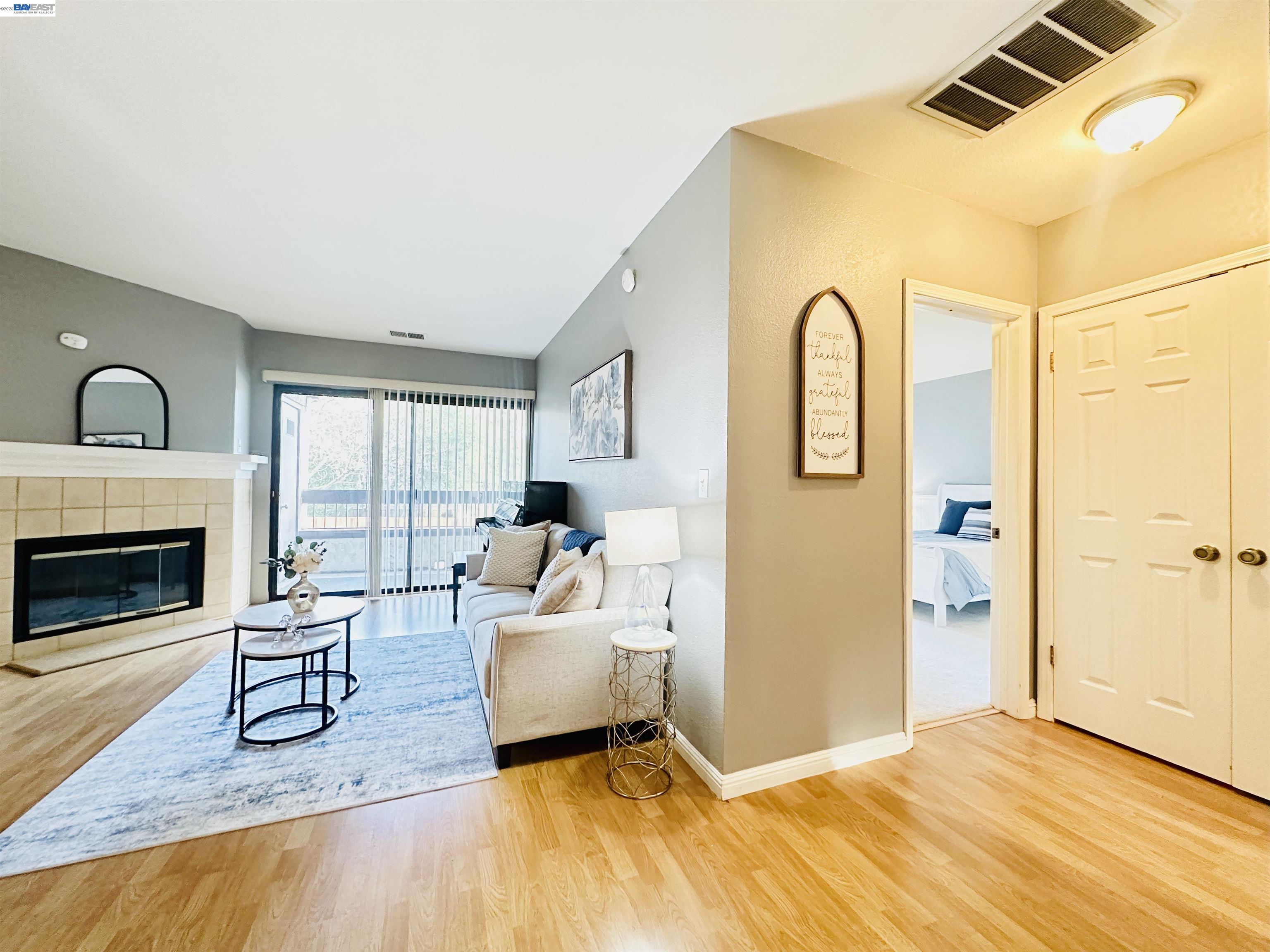320 North Villa Way Walnut Creek, CA 94595 - Photo 10 of 36 a living room with furniture and a fireplace