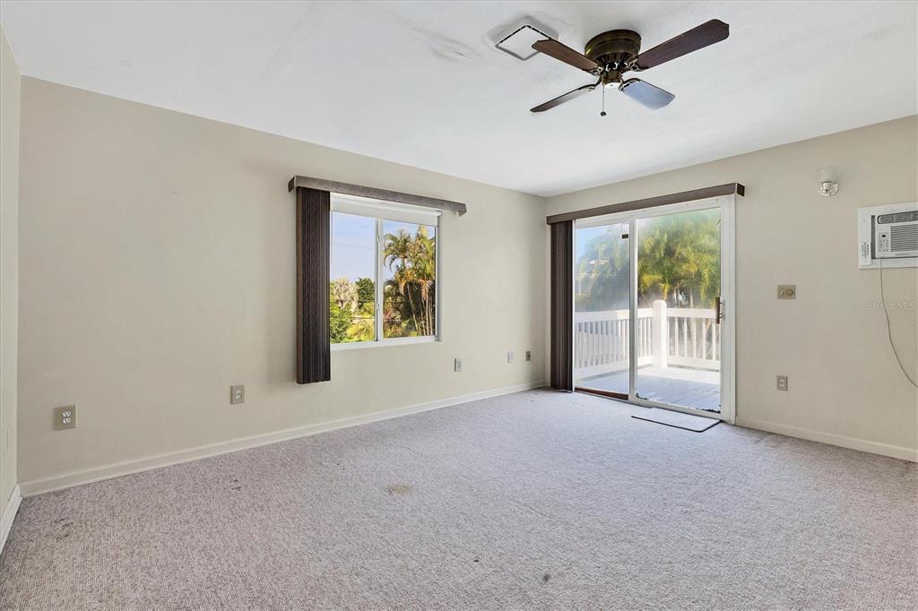 709 Armada Road South Venice, FL 34285 - Photo 27 of 52 2nd floor bedroom with patio & bath