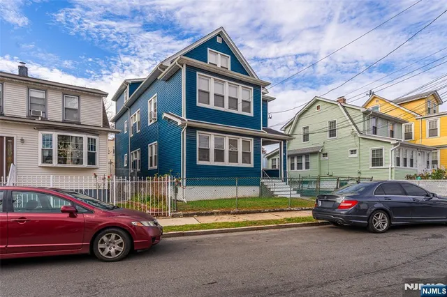 a car parked in front of a house