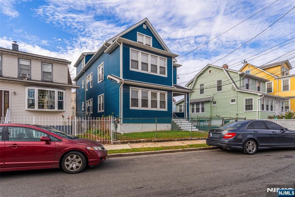 a car parked in front of a house