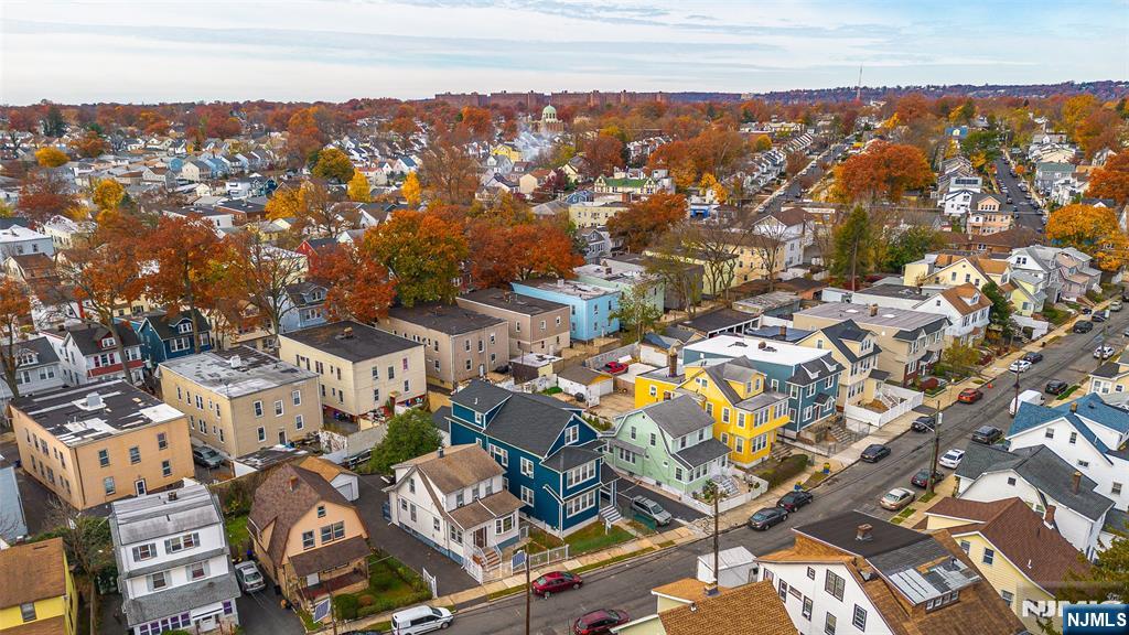 50 Unity Avenue Newark, NJ 07106 - Photo 38 of 42 an aerial view of residential building with parking space