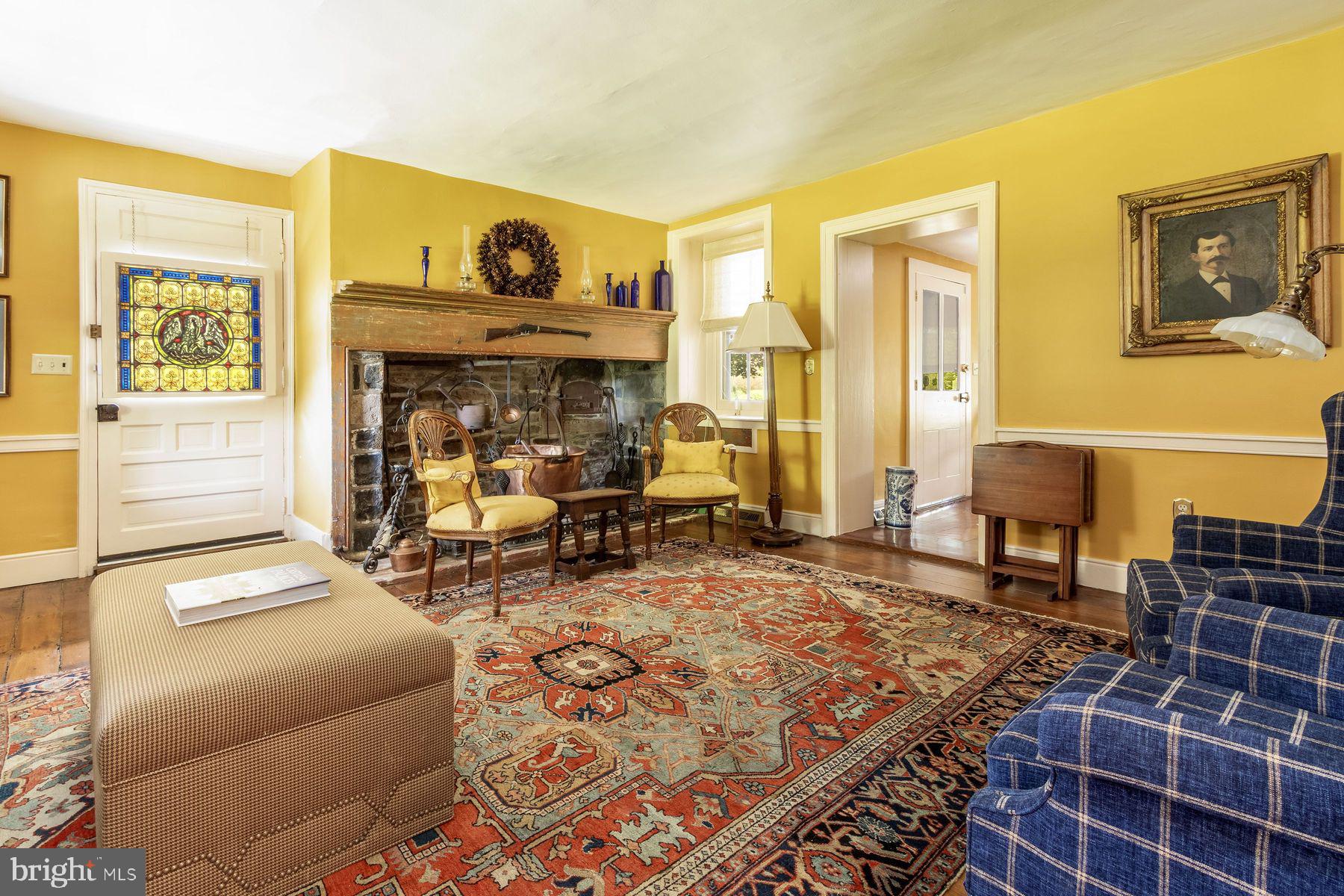 3150 Rushland Road Jamison, PA 18929 - Photo 16 of 50 a living room with furniture and a fireplace