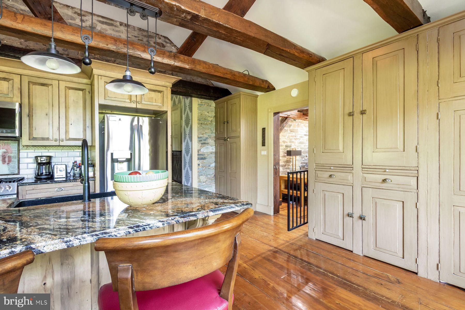 3150 Rushland Road Jamison, PA 18929 - Photo 23 of 50 a dining room with wooden floor and a table and chair