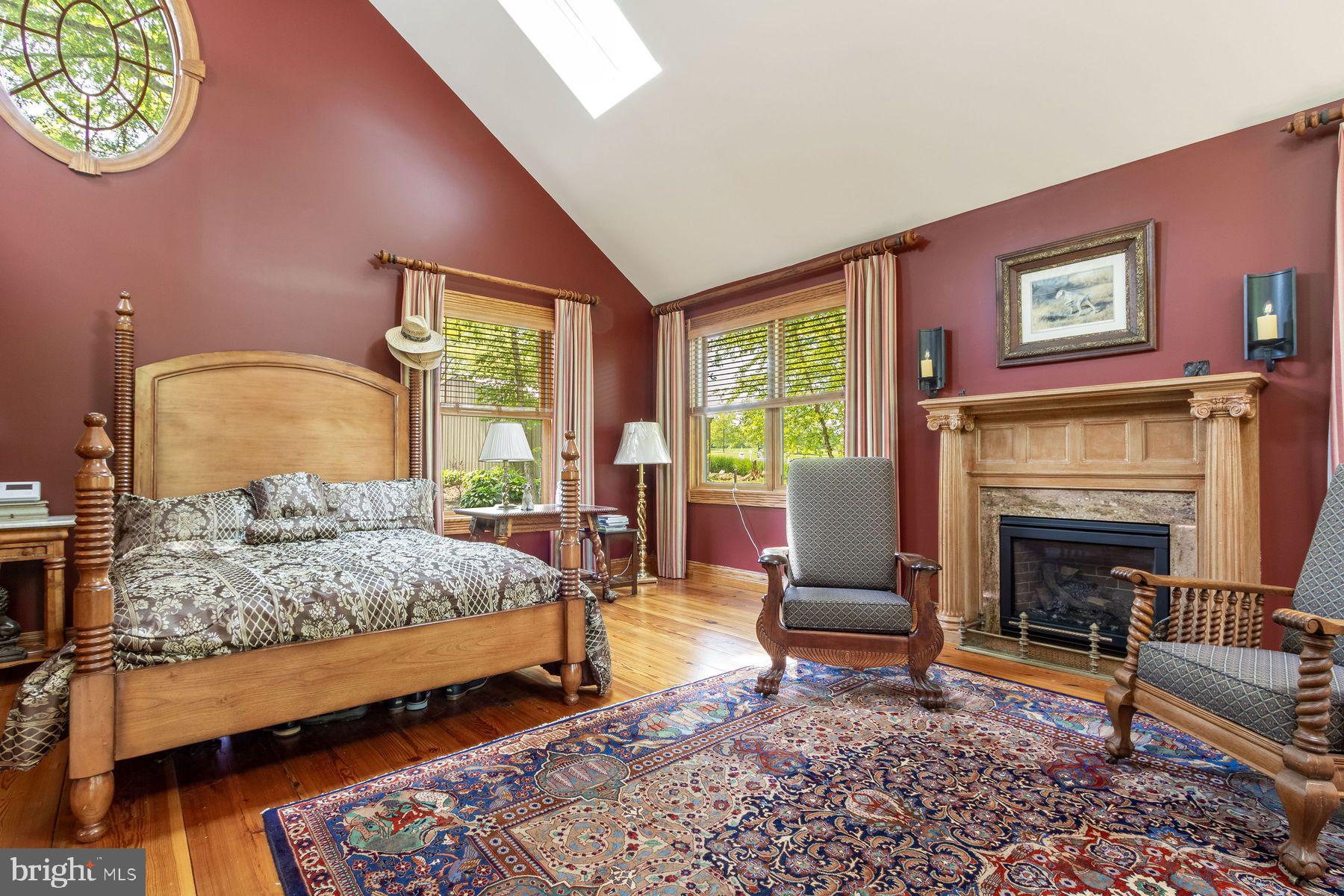 3150 Rushland Road Jamison, PA 18929 - Photo 29 of 50 a bedroom with a bed and a fireplace