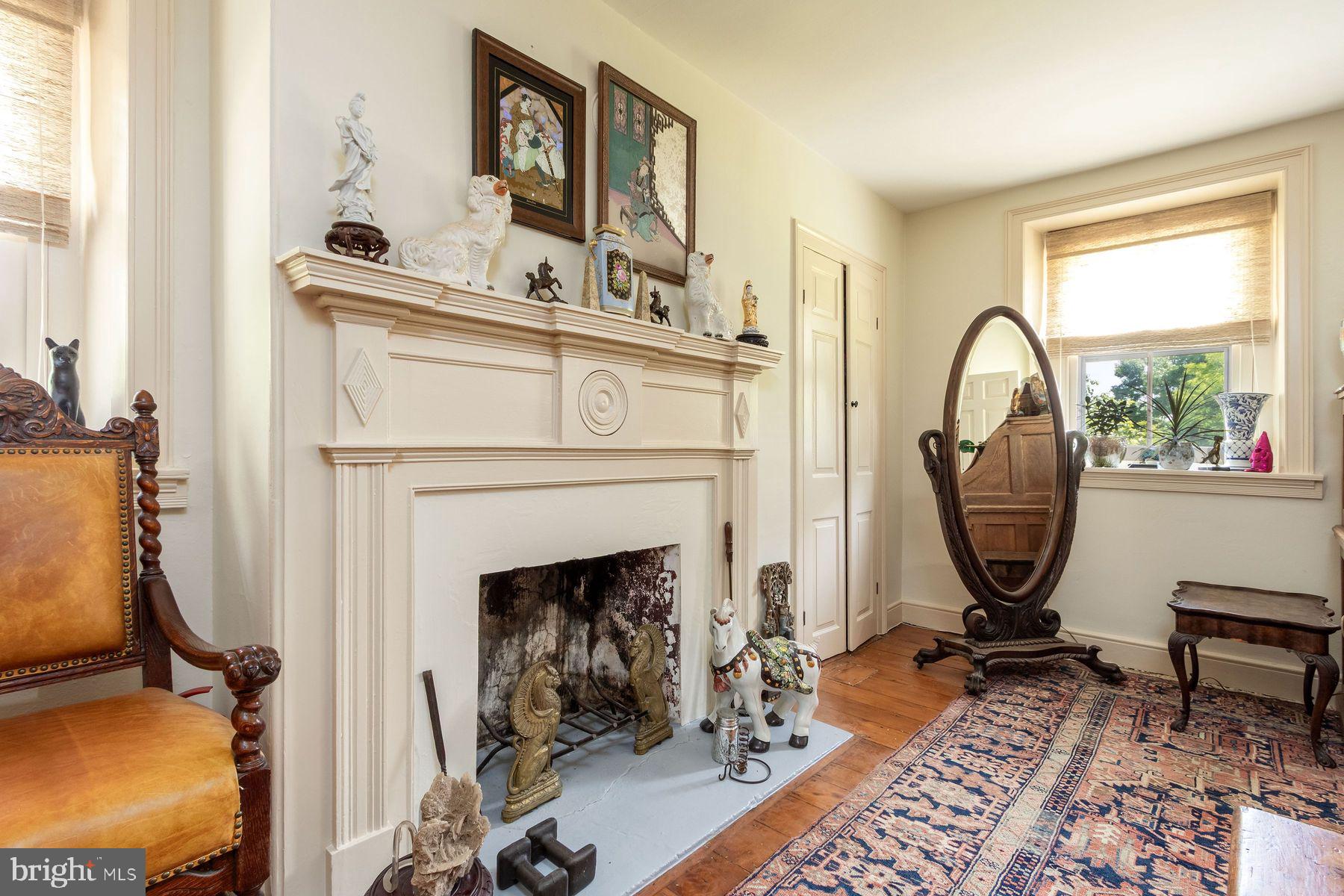 3150 Rushland Road Jamison, PA 18929 - Photo 35 of 50 a living room with furniture a fireplace and a window
