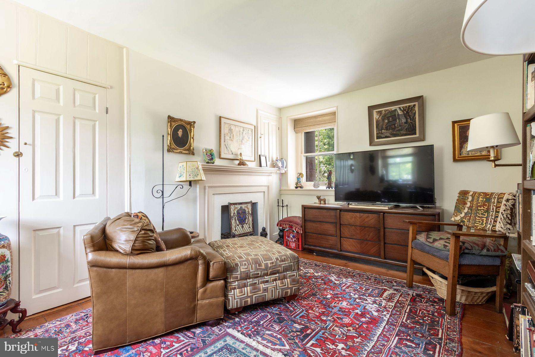 3150 Rushland Road Jamison, PA 18929 - Photo 37 of 50 a living room with furniture and a flat screen tv