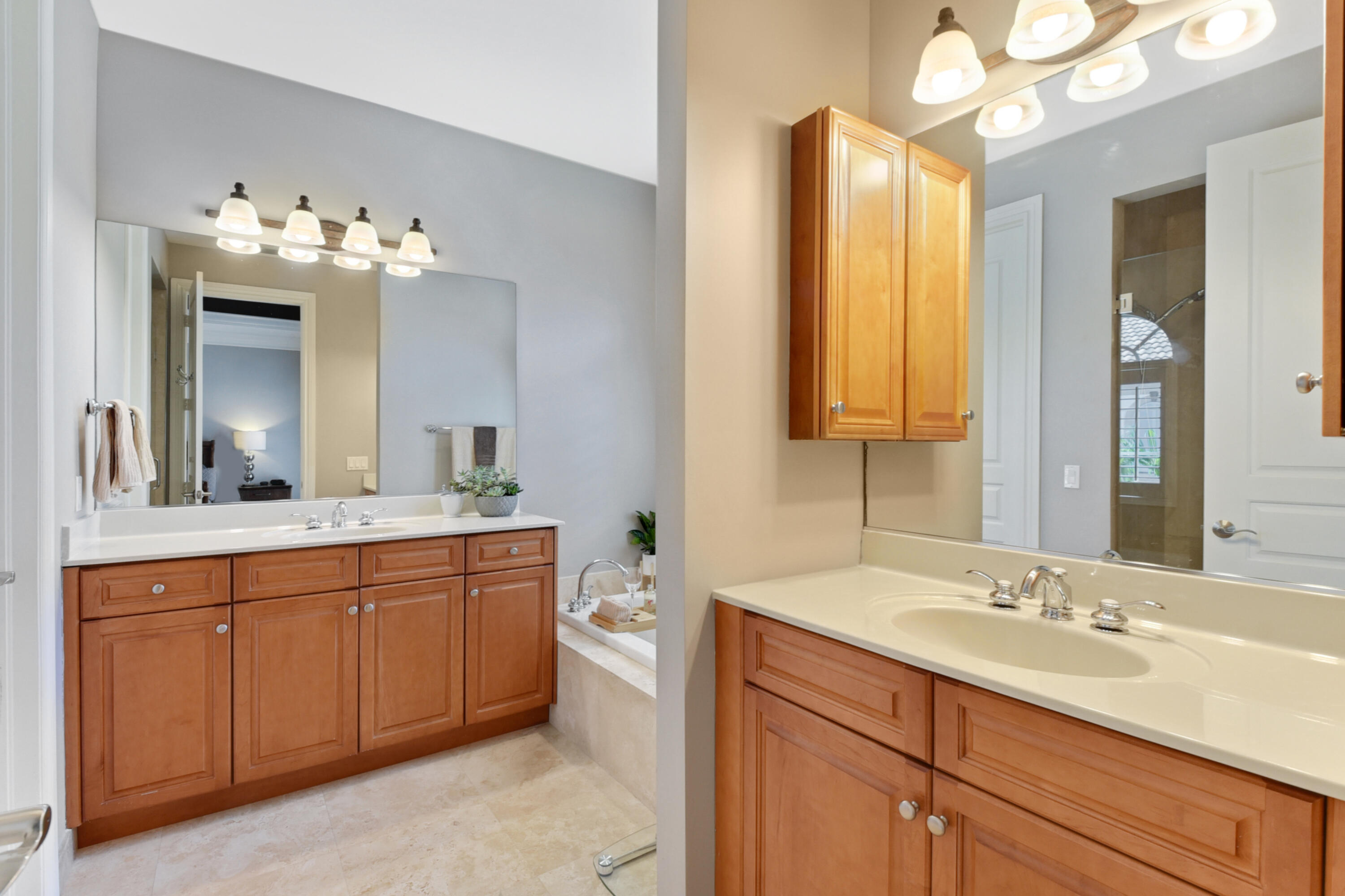 609 Renaissance Way Delray Beach, FL 33483 - Photo 13 of 22 a bathroom with a double vanity sink mirror and double