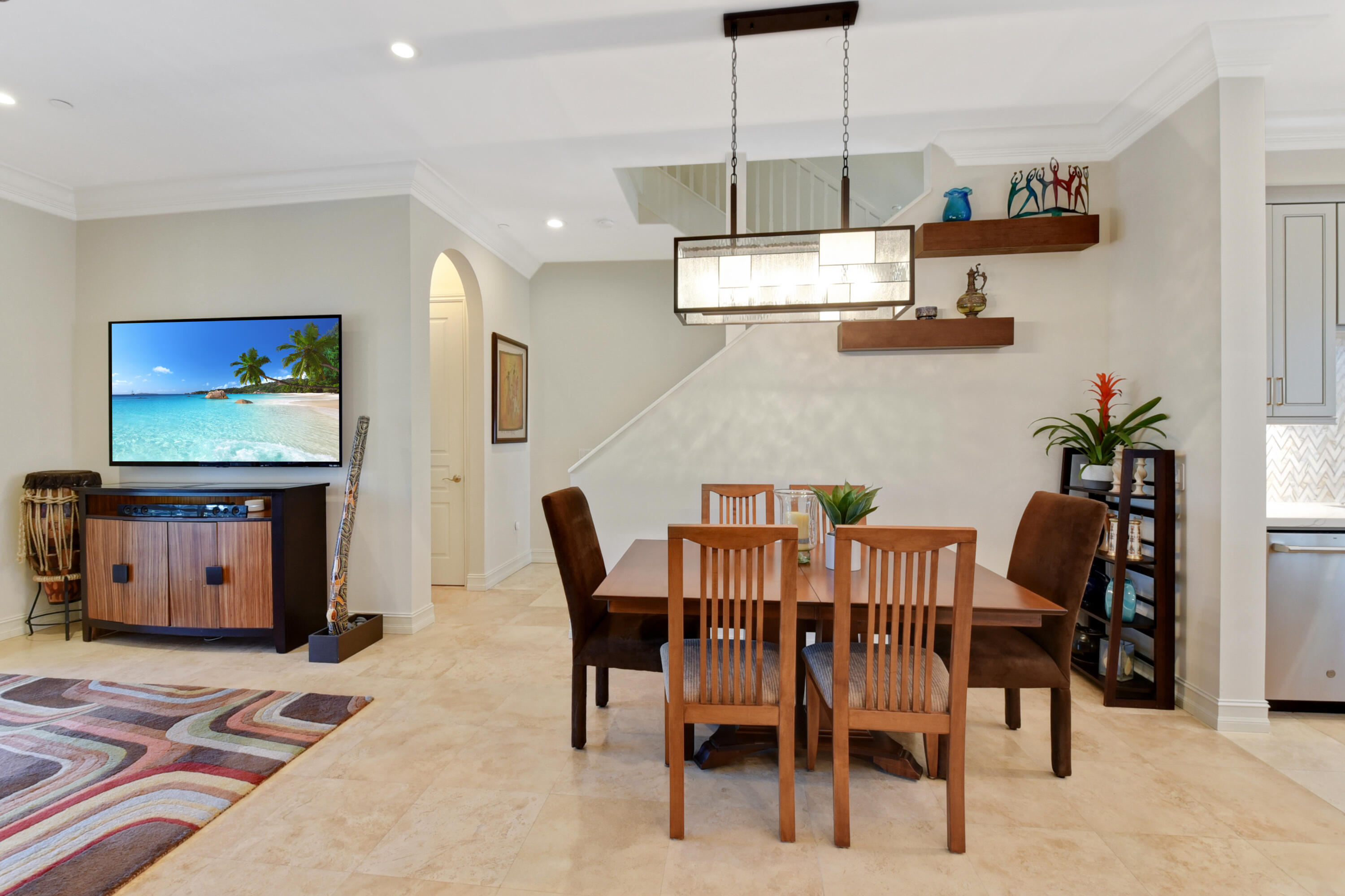 609 Renaissance Way Delray Beach, FL 33483 - Photo 5 of 22 a view of a dining room with furniture