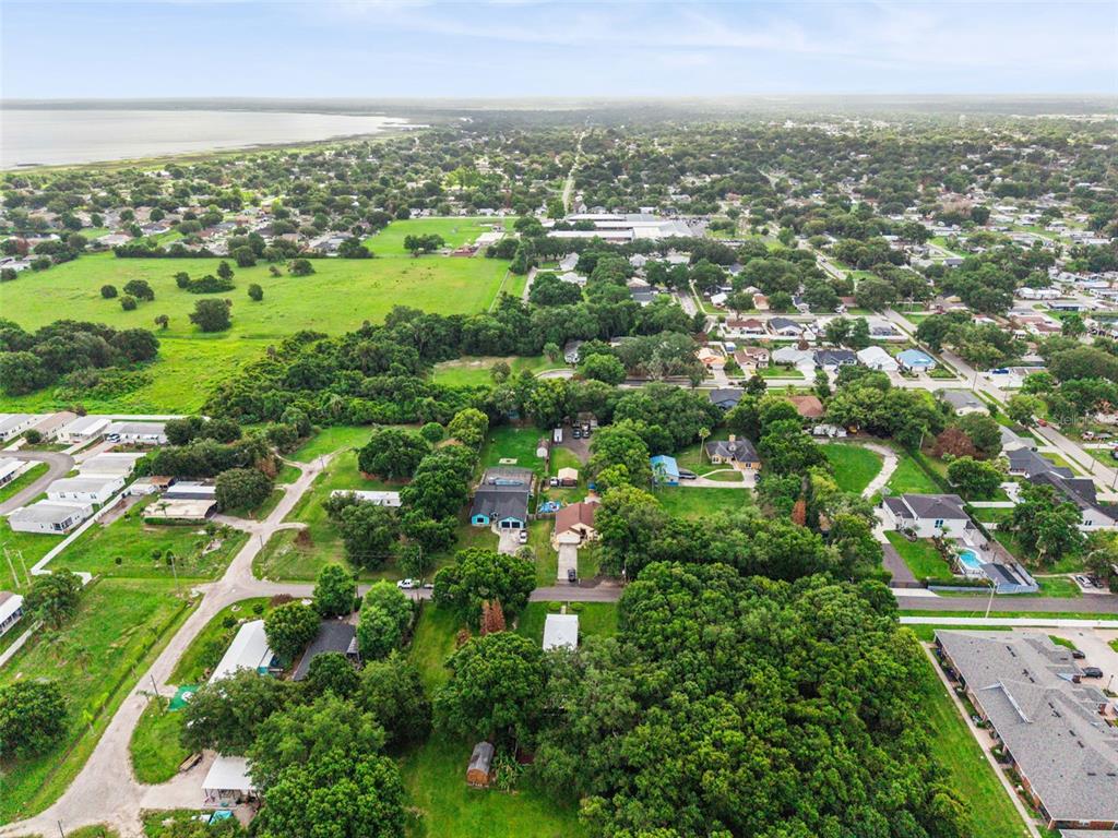 420 Jacks Memorial Road St. Cloud, FL 34769 - Photo 28 of 31 an aerial view of multiple house