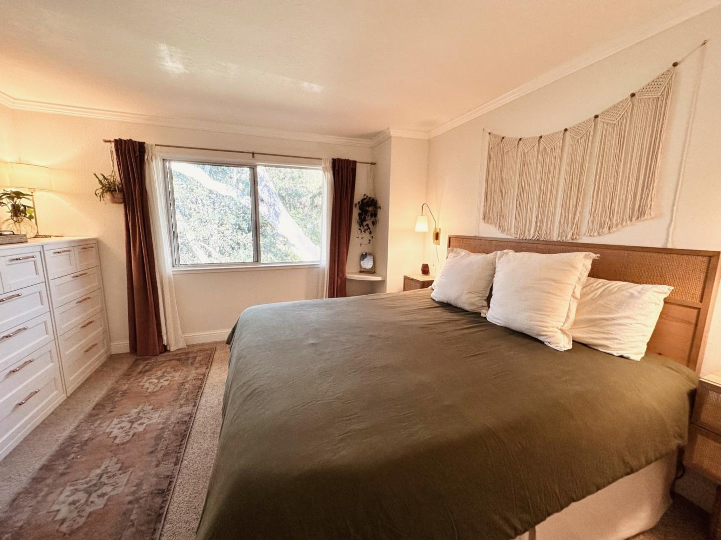 113 Madeline Drive, Unit 3 Aptos, CA 95003 - Photo 13 of 19 a bedroom with a bed and a window