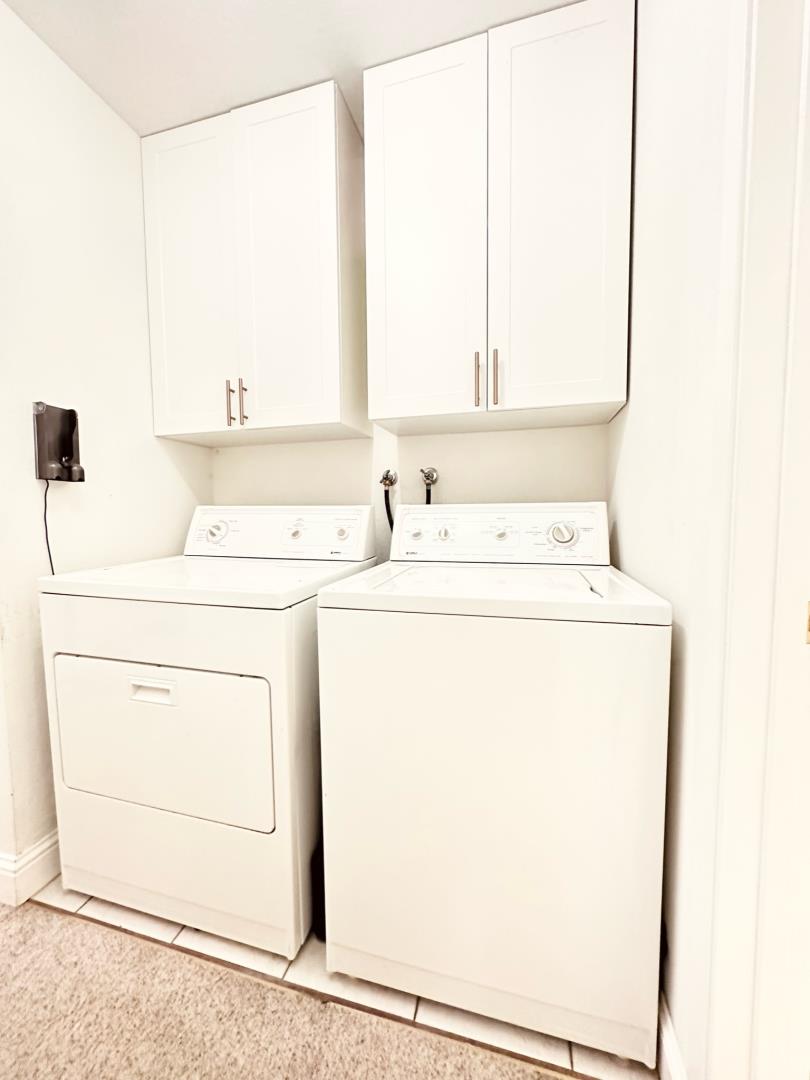 113 Madeline Drive, Unit 3 Aptos, CA 95003 - Photo 17 of 19 a utility room with dryer and washer