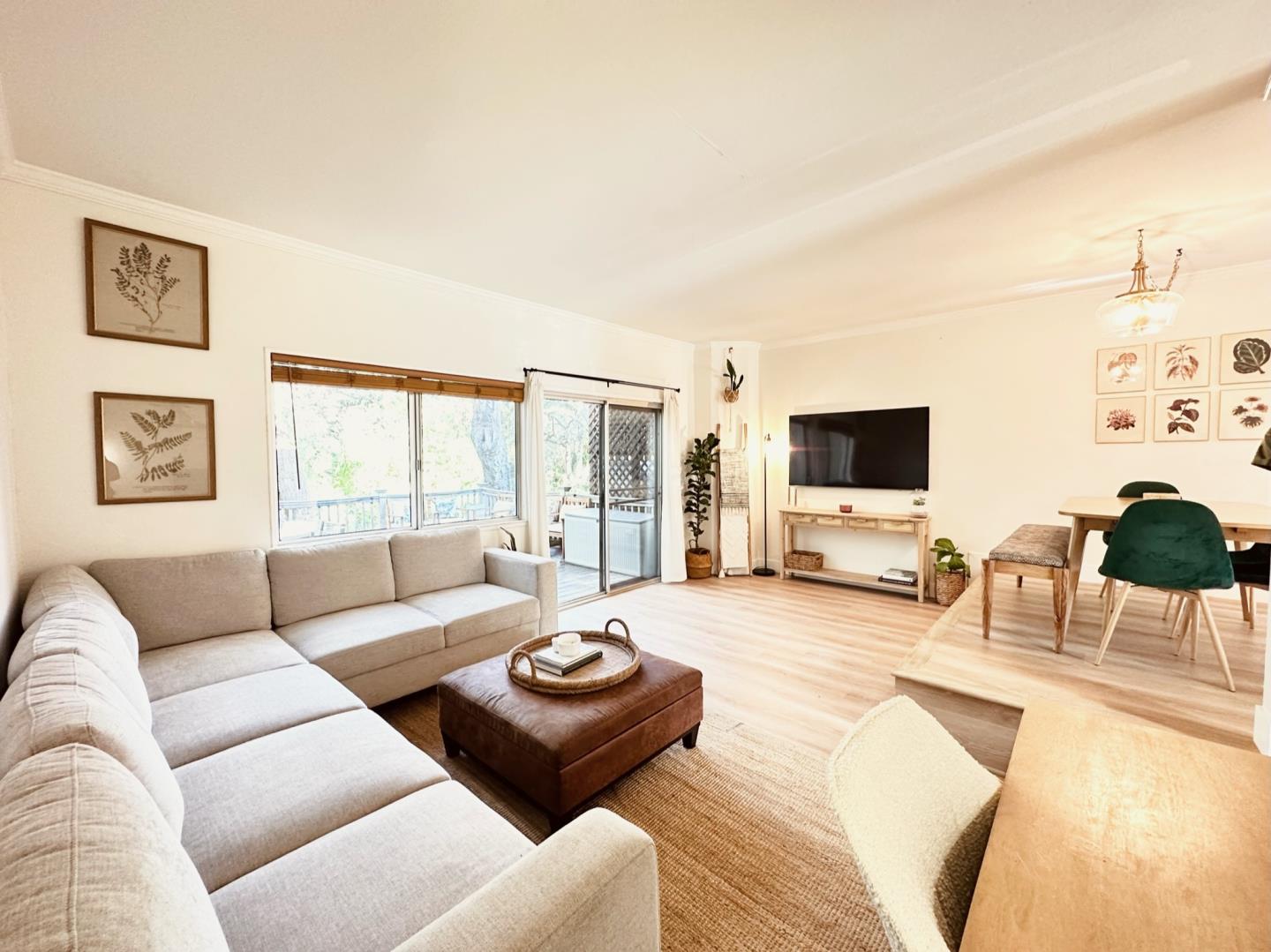 113 Madeline Drive, Unit 3 Aptos, CA 95003 - Photo 5 of 19 a living room with furniture and a flat screen tv